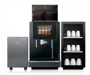 Franke A600 commercial coffee machine with touch display and modern cup storage setup.
