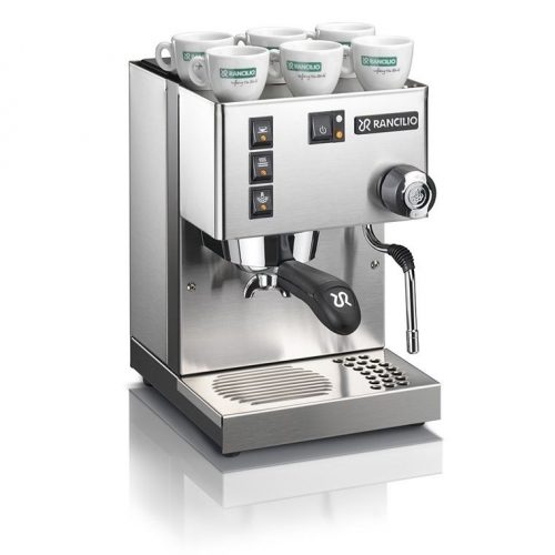 Rancilio Silvia espresso machine with warm white cups, precision controls, and milk frothing wand.
