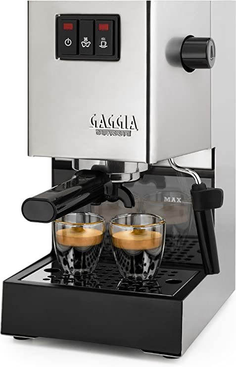 Gaggia Classic espresso machine brewing rich coffee into two cups, featuring sleek design and easy controls.