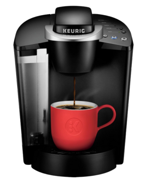 Keurig K Classic, a sleek black coffee maker, brewing into a vibrant red mug.