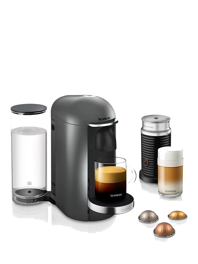 Nespresso Vertuo Plus machine with milk frother and premium pods, set up for modern home coffee experience.