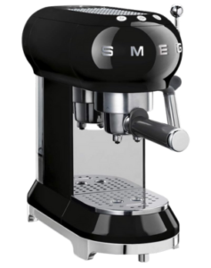 Smeg ECF01 coffee machine, a compact black espresso maker featuring a shiny silver coffee spout and steam wand.