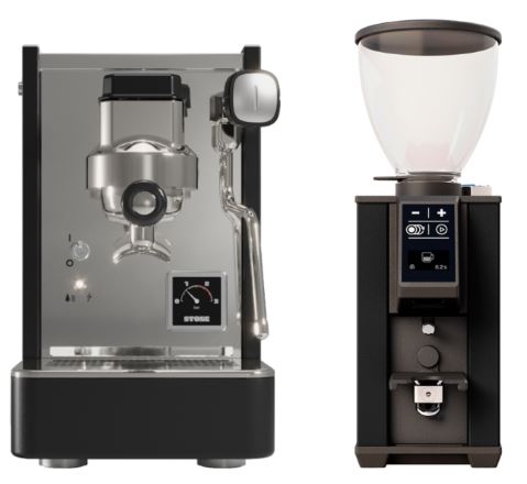 Stone and Pebble professional espresso machine and coffee grinder set in a sleek kitchen setup.
